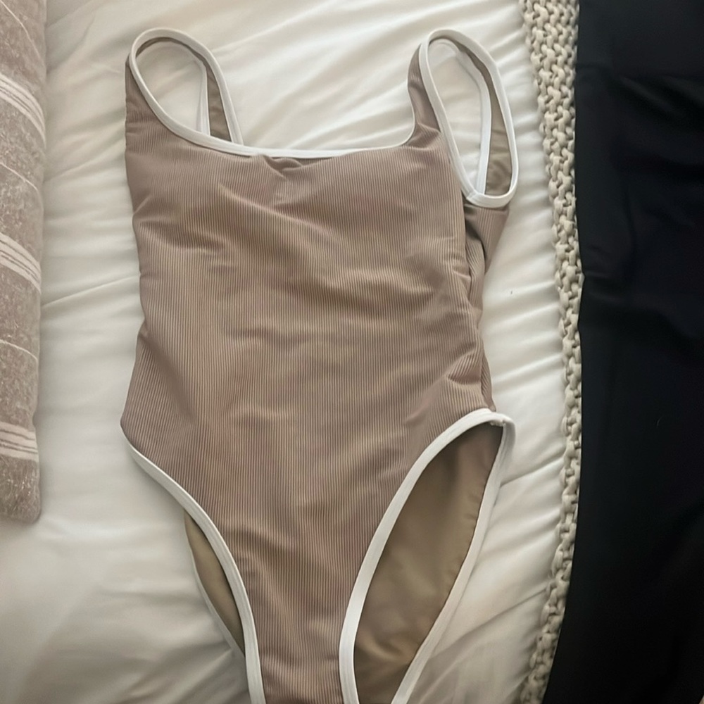 LainSnow Small never worn one piece swimsuit